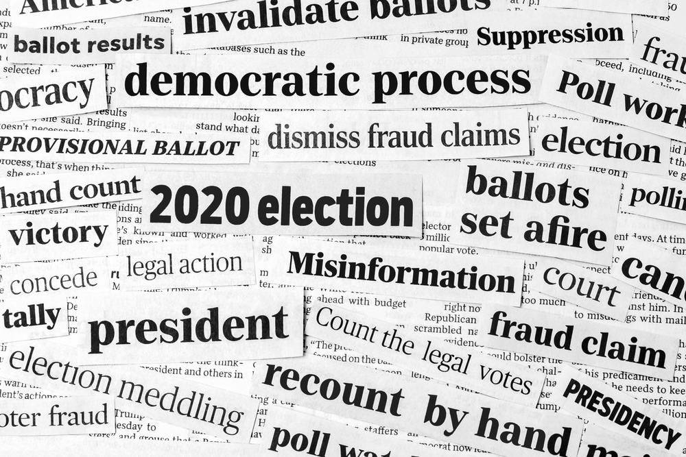 Newspaper headlines depicting words such as election, president, recount, ballots, electoral integrity, stolen election