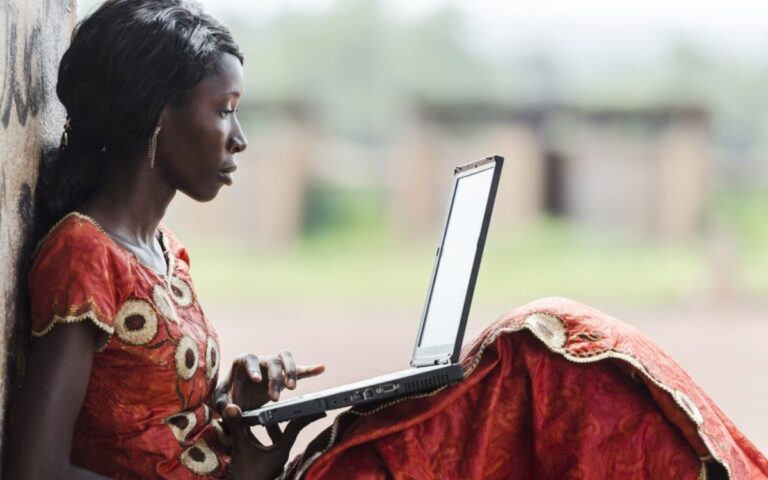 African woman working on a computer