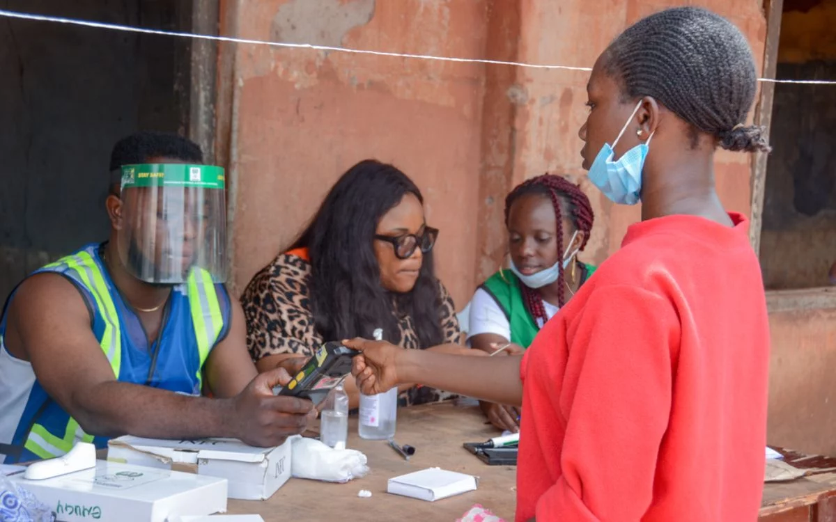 woman exercising the right to vote in West Africa
