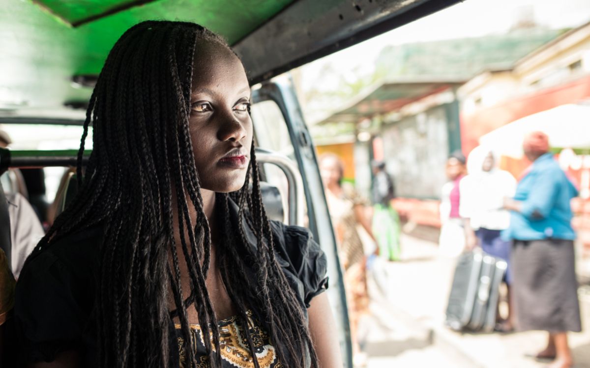 Kenyan girl traveling on a bus